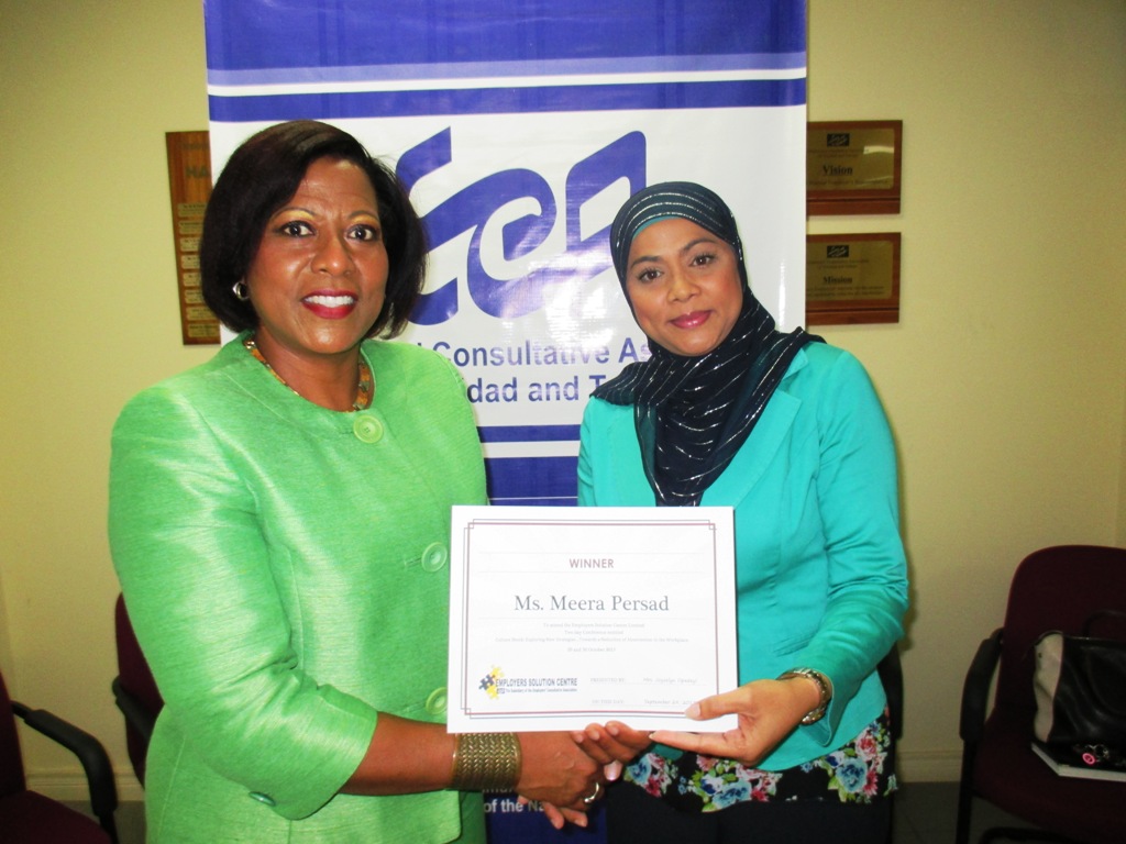 L-R: ECA's CEO with Survey Winner, Meera Persad-Mohammed of R&C Enterprises Ltd.