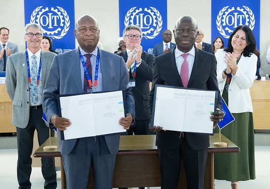 President of the 113th International Labour Conference, The Hon. Edgar Moyo (Public Service, Labour and Social Welfare, Zimbabwe) and Director General of the ILO, Gilbert Houngbo, present the newly adopted Biological Hazards in the Working Environment Convention, 2025 (No. 192), flanked by (L-R) James Ritchie (Workers’ Spokesperson), Luis Claudino de Oliveira (Chairperson of the Standard-Setting Committee on Biological Hazards), and Delphine Rudelli (Employers’ Spokesperson)